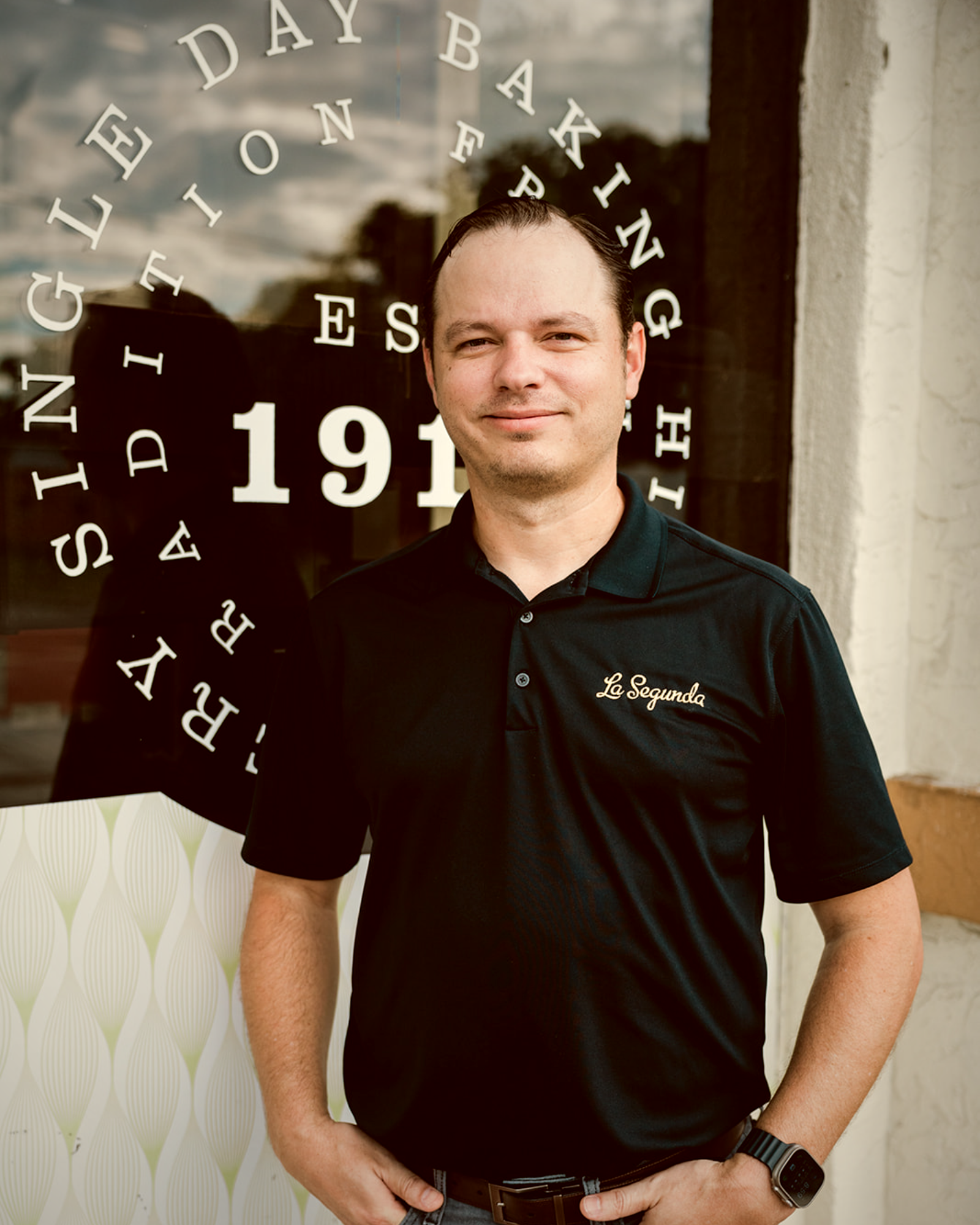 Editorial portrait of Giuseppe Bua, National Sales Manager at La Segunda, photographed outside the Ybor City bakery.